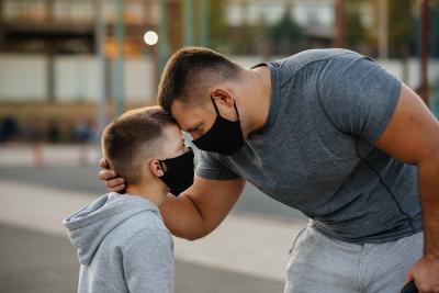 dad and son in masks
