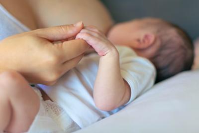 mother breastfeeding baby latching image lactation